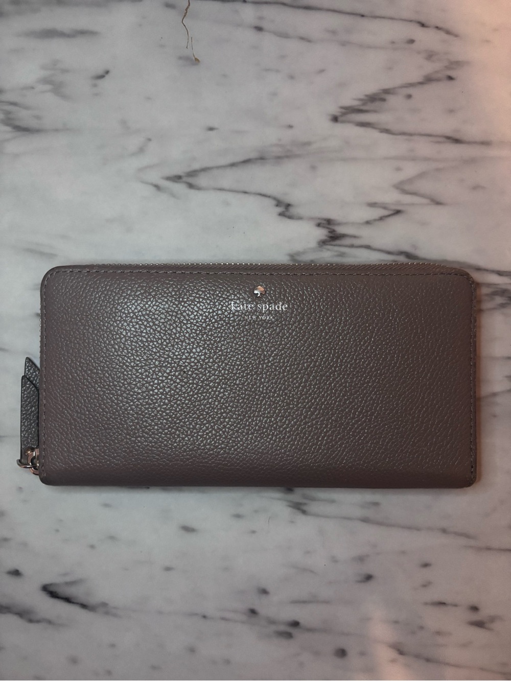 Kate Spade New York Taupe-gray pebbled leather zip-around continental wallet